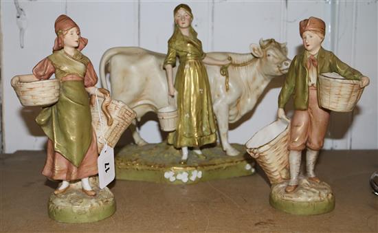 3 Royal Dux Bohemian figures: cowgirl with cow, girl with two panniers and boy with two panniers
